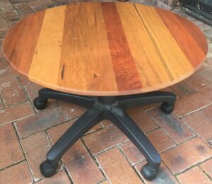 Rotating outdoor table. Mixed hardwood. Recycled desk chair